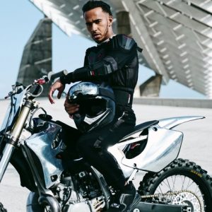 Lewis Halmilton in leathers on a motorbike