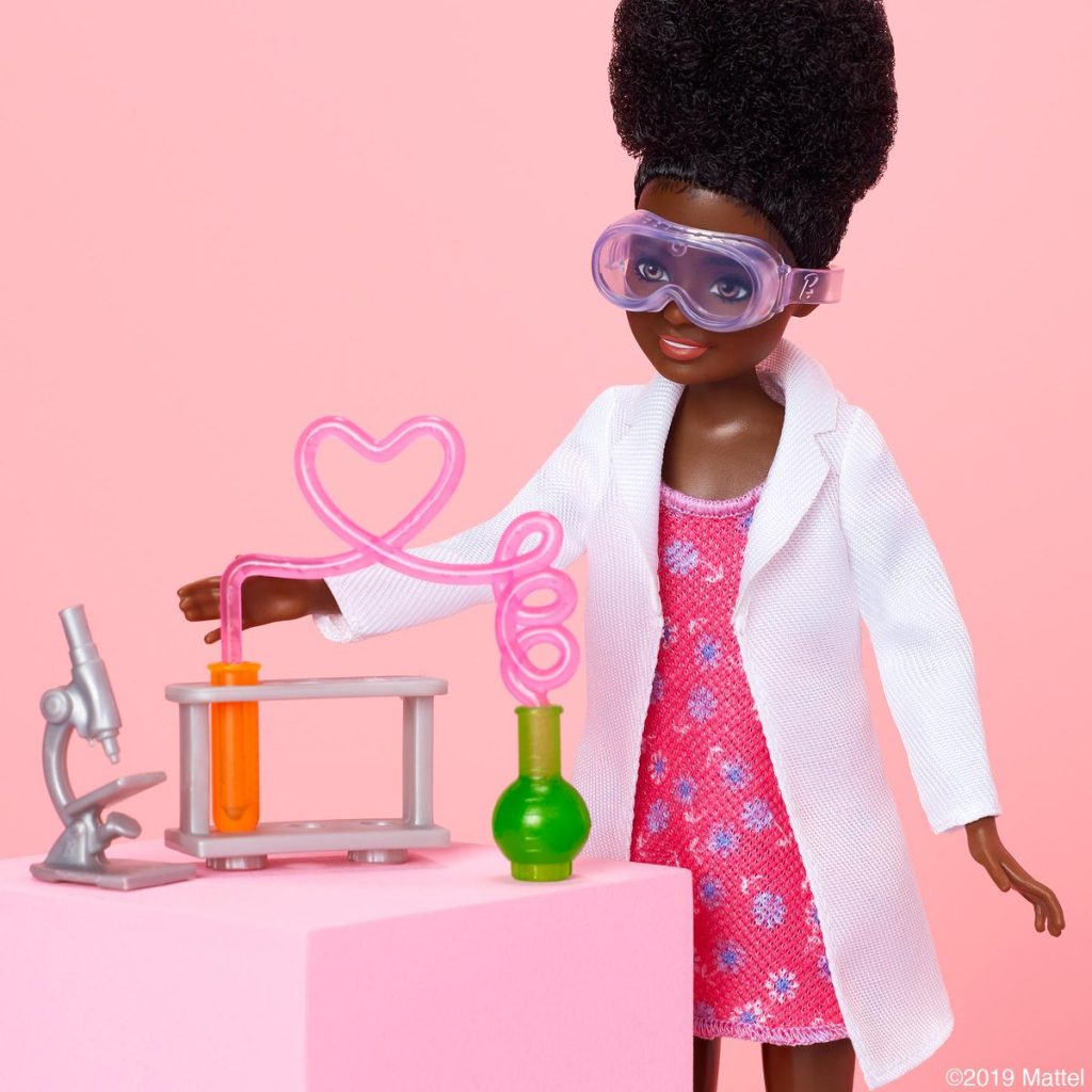 Black Barbie sister doll with school science accessories