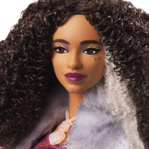 teenage doll with long black curly hair